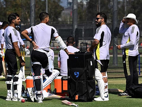 Indias Virat Kohli (left) with teammates during a practice session at the Optus Stadium in Perth on Wednesday.