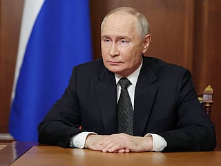 In this pool photograph distributed by the Russian state agency Sputnik, Russia's President Vladimir Putin delivers a televised address to the nation at the Kremlin in Moscow on November 21, 2024. 