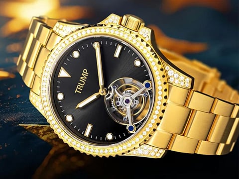 A Trump Victory black and gold Tourbillon watch.