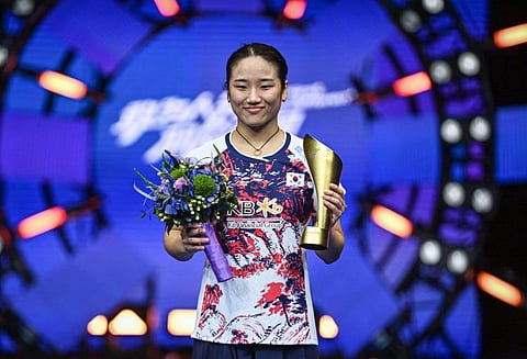 Gold medallist South Korea's An Se-young celebrates with the trophy during an award ceremony for the women's singles final match of the BWF World Tour China Masters 2024 badminton tournament in Shenzhen, in southern China's Guangdong province on Sunday.