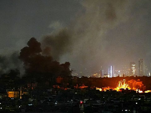 Smoke rises and a fireball errupts from the site of Israeli airstrikes that targeted Beiruts southern suburbs on November 24, 2024, amid the ongoing war between Israel and Hezbollah. Lebanon's state media reported a slew of Israeli air strikes on Beirut's southern suburbs on November 24, after the Israeli military posted evacuation calls online for parts of the Hezbollah bastion. (Photo by AFP)