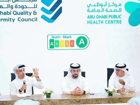 (L to R) Dr Ahmed AlKhazraji, Eng Abdulla Alyazeedi and Eng Abdulla Al Muaini announce the new nutrition labelling system at press conference at the Abu Dhabi International Food Exhibition on Tuesday