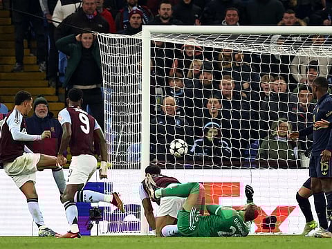 Aston Villa's midfielder Morgan Rogers (L) scores, but the goal is disallowed, during the UEFA Champions League football match against Juventus at Villa Park in Birmingham, central England, on November 27, 2024.   