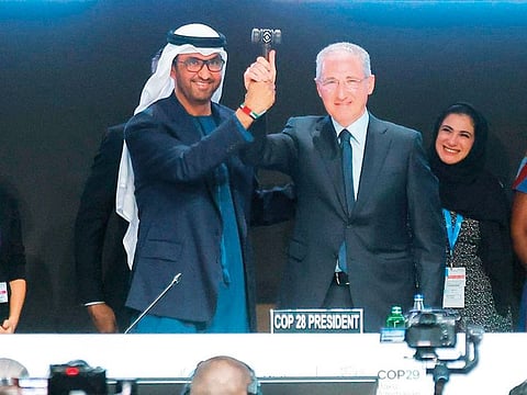 COP28 President Dr Sultan Al Jaber passes the hammer to the COP29 President Mukhtar Babayev at the United Nations climate change conference COP29 opening in Baku, Azerbaijan. At COP29, the UAE urged nations to honour their commitments made at COP28