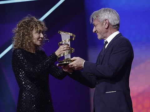 US actor/director Sean Penn receives the Festival Star award from his Italian counterpart Valeria Golino on the second day of the 21st Marrakesh International Film Festival in Marrakesh on November 30, 2024.