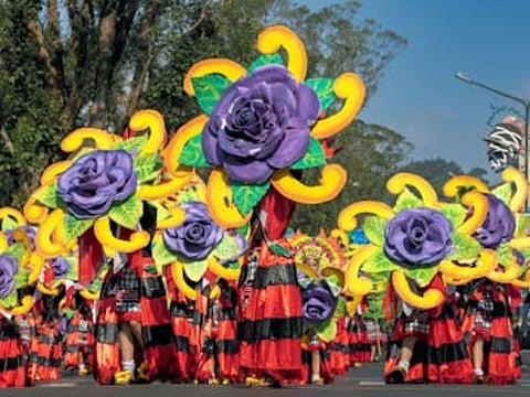A costume parade in Baguio City, a popular destination for escaping the tropical heat of the lowlands. The city, known as the summer capital of the Philippines, is located at an elevation of more than 4,800 feet above sea level. It's about 4 hours by car north of the capital Manila.