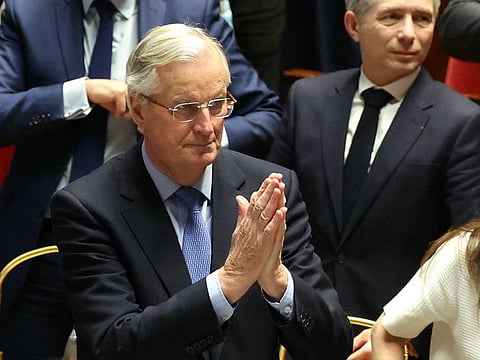 French Prime Minister Michel Barnier gestures after the result of the no-confidence vote on his administration at the National Assembly in Paris on December 4, 2024 as French MPs voted to oust his government after just three months in office in a move which deepens a political crisis in the country.   