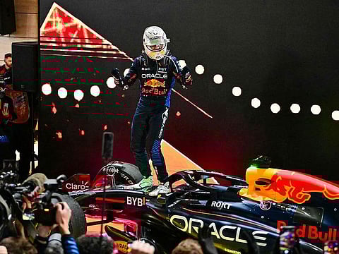 Red Bull’s Dutch driver Max Verstappen celebrates his win in the Qatar Formula One Grand Prix at the Lusail International Circuit, north of Doha, on December 1, 2024. 