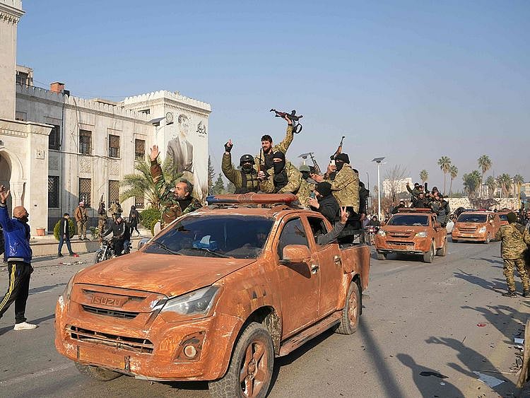 Syrian anti government fighters celebrate 