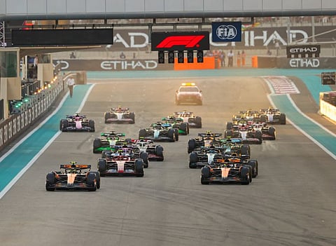 Lando Norris of McLaren leads the pack at the start of  the Formula 1 Etihad Airways Abu Dhabi Grand Prix 2024 at Yas Marina Circuit on Sunday.