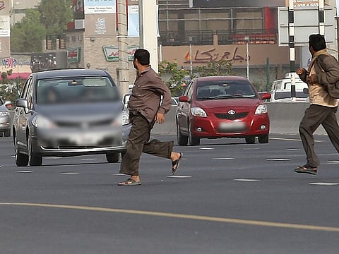 Some people still cross roads from undesignated spots despite hefty fines and accident risks.