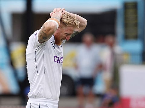 Englands Ben Stokes leaves the field on day three of the third cricket Test match against New Zealand at Seddon Park in Hamilton on Monday.