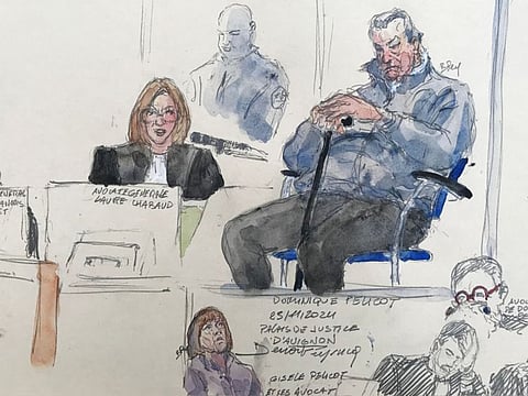 This court sketch created at the Avignon courthouse shows defendant Dominique Pelicot during his trial in which he is accused of drugging his wife Gisele Pelicot (Bottom centre) for nearly ten years and inviting strangers to rape her at their home in Mazan, a small town in the south of France.  