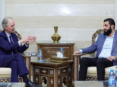  UN Special Envoy Geir Pedersen meets Hayat Tahrir Al Sham (HTS) leader Abu Mohammed Al Jolani, now using his real name Ahmed al-Sharaa in Damascus on December 15, 2024.  