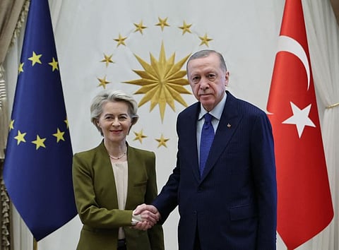 European Commission President Ursula von der Leyen (left) shaking hands with Turkish President Recep Tayyip Erdogan at the Presidential Palace in Ankara.  