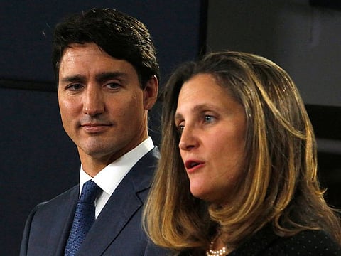 Canada's Prime Minister Justin Trudeau (L) and Minister of Foreign Affairs Chrystia Freeland (R) speak at a press conference to announce the new trade pact with Canada, the United States, and Mexico in Ottawa, October 1, 2018 in this file photo. Deputy Prime Minister Chrystia Freeland in a surprise announcement on December 16, 2024, quit over disagreements with Justin Trudeau on Canada's response to US President-elect Donald Trump's tariff threats. 