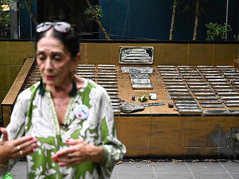 This photograph taken on November 21, 2024 shows NAT Association founder Elisabeth Zana, who lost her daughter Natacha in the 2004 tsunami, talking with AFP at the Tsunami Memorial Park on Koh Phi Phi. 