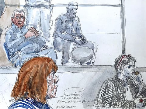 This court-sketch made on December 19, 2024 in Avignon shows Dominique Pelicot (left) in the defendant box as his lawyer Beatrice Zavarro (right) attends during the hearing of the verdict of the court that sentenced him to the maximum term of 20 years jail for committing and orchestrating the mass rapes of his ex-wife Gisele Pelicot (bottom left) with dozens of strangers he recruited online. 
