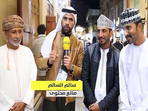 Abdul Rahim Abdullah al Rawahi and Abdullah Salim al Rawahi from Mudhaibi in North Sharqiyah, and Salim Abdullah al Saidi from Saham in North Batinah with a news anchor.