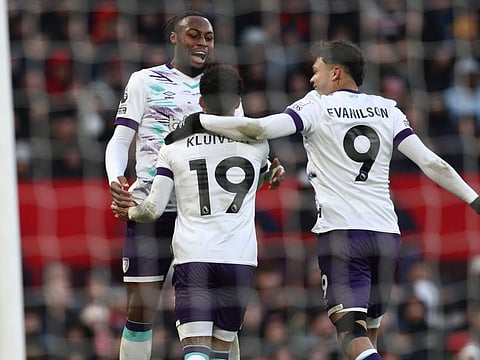 Bournemouth's Dutch striker Justin Kluivert (centre) celebrates with striker Antoine Semenyo (left) and striker Evanilson after scoring their second goal during the English Premier League football match against Manchester United at Old Trafford in Manchester on Sunday.