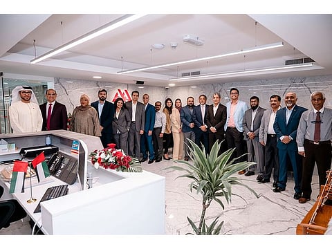 The A.A. Al Moosa Enterprises Team at the new office on Zabeel Road