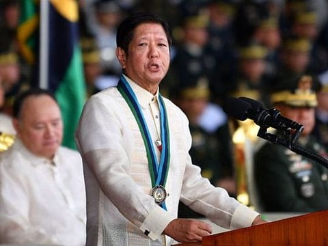 Philippines' President Ferdinand Marcos Jr. delivers a speech during the 89th founding anniversary of the Armed Forces of the Philippines (AFP) at Camp Aguinaldo in Manila on December 20, 2024.  Manila and Washington, longstanding treaty allies, have deepened their defence cooperation since Philippine President Ferdinand Marcos took office in 2022.
