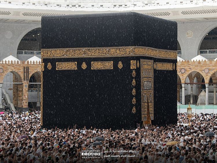 The faithful encircling the Holy Kaaba in the courtyard of the Grand Mosque in Mecca amid rainfall earlier this week. 