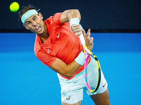 Spain's Rafael Nadal serves as he plays along with partner against Australia's Max Purcell and Jordan Thompson during their men's doubles match at the Brisbane International on Sunday.