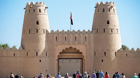 The fort's entrance is flanked by two large round towers 
