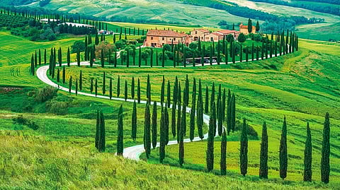 The exquisite landscape of rolling clay hills where the colour palette changes as crops grow and ripen, and where ancient stone-built hilltop towns blur into nature 