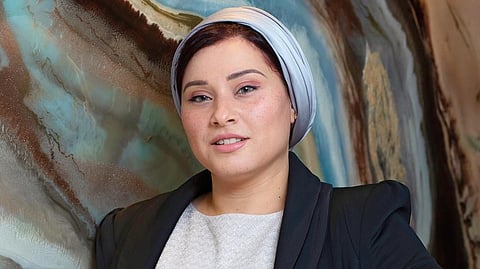 Dina Khataan is a self-taught master of experimental art using resin and fluid mixes 