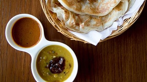Mamak’s sour fish curry and sambal-spiced dhal are soothed by flaky roti and foamy teh tarik. 