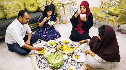 Maitha Essa, a qualified tour guide, gives guests an overview of local traditions - and also a delicious dinner 