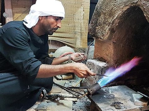 Abdulrahman Abood Ahmad bin Nahaira is keeping the art of khanjar making alive. 