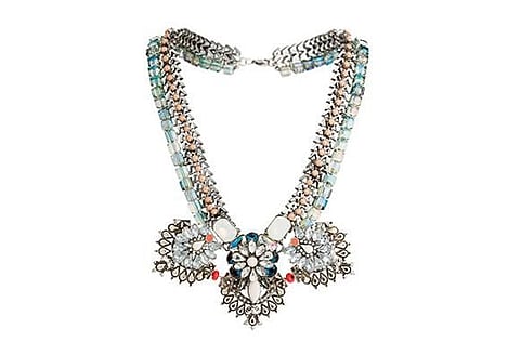 Necklace: Dh195, Freedom at Topshop. 