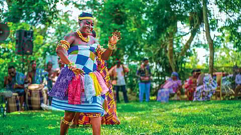 A dancer wearing Kente clothing, Ghana’s traditional fabric 