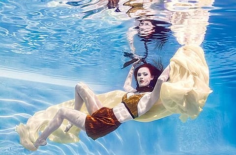 Bikini, Dh95, Asos; Shorts, Dh99, earrings, Dh59 and neck tie, Dh49, all H&M. 