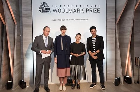 Bodice's Ruchika Sachdeva (pictured next to her winning look) with fashion designer Manish Malhotra and Woolmark's John Roberts in Dubai on July 24, 2017. 
