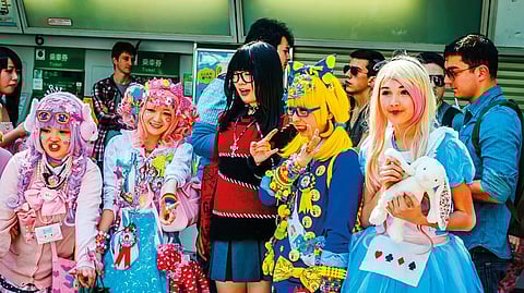 In Harajuku, many young people engage in cosplay to resemble anime characters, punk musicians 