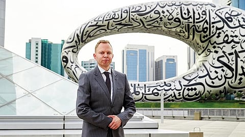 Ville Korpela with the Museum of the Future in the background. Ville is convinced the emirate is the most futuristic city on the planet 
