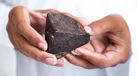 Most of the exhibits at the Al Thuraya Astronomy Centre, such as this piece of meteorite, can be touched and examined 