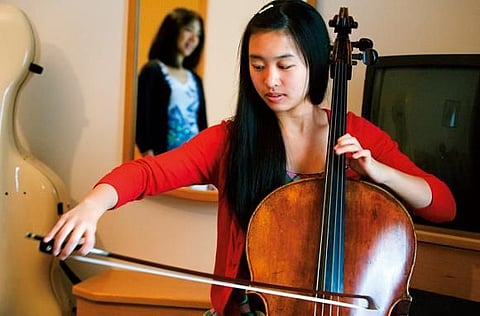 Sarina sets aside seven hours a day to practise music.  