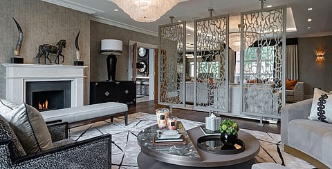 The striking bespoke dividers create privacy without breaking the flow of the open-plan family room, while the tonal use of colour and variety of texture and pattern adds interest, tactility and depth. 