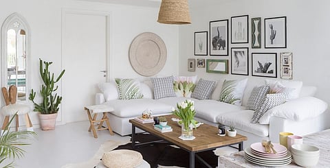  The rattan platter, lamp, poufs, stool and mirror are all from the White Moss collection.