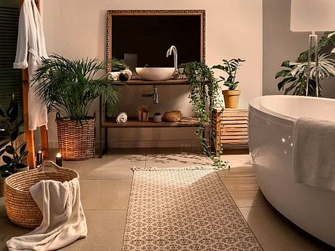Low lighting and fragrances that help you relax create a spa-like setting in your bathroom