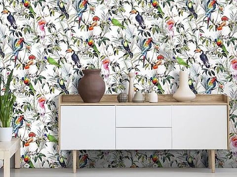 A flurry of tropical bIrds adds a spirited vibe to this simple setting from British brand Cultfurniture.