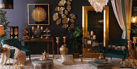 This Ramadan collection from Pan Emirates features bold decor ideas including a sparkling chandelier, golden gingko leaf wall decor and embroidered poofs and cushions
