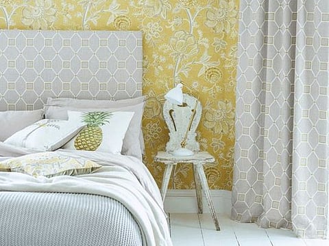 Shalimar wallpaper, Dh350 per roll, and Baroque Trellis embroidery fabric Dh275 per metre, both by Sanderson.
