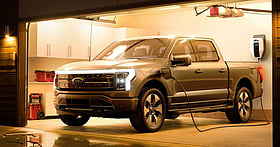 Ford reports loss on EV retreat but lifts 2026 forecast