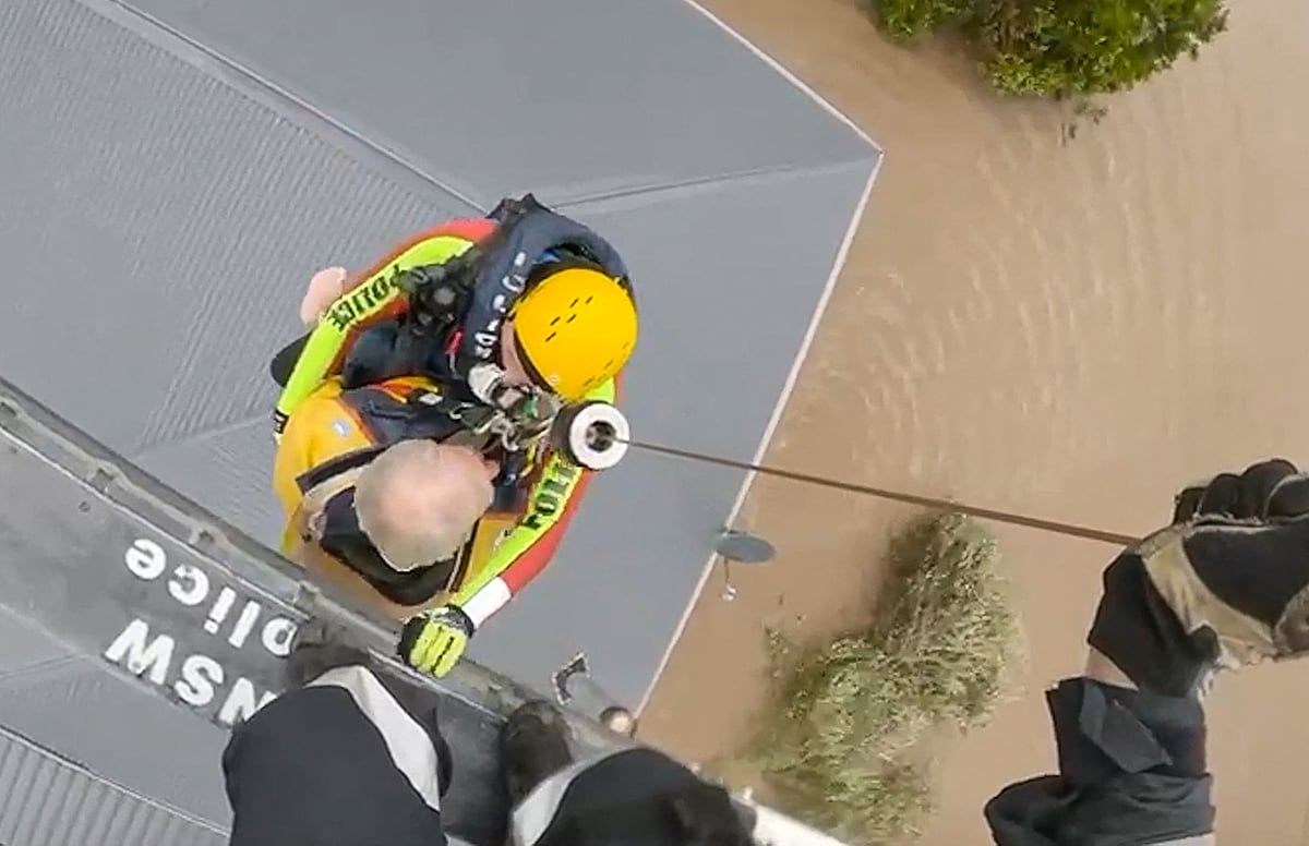 Australians rescued off rooftops amid deadly floods